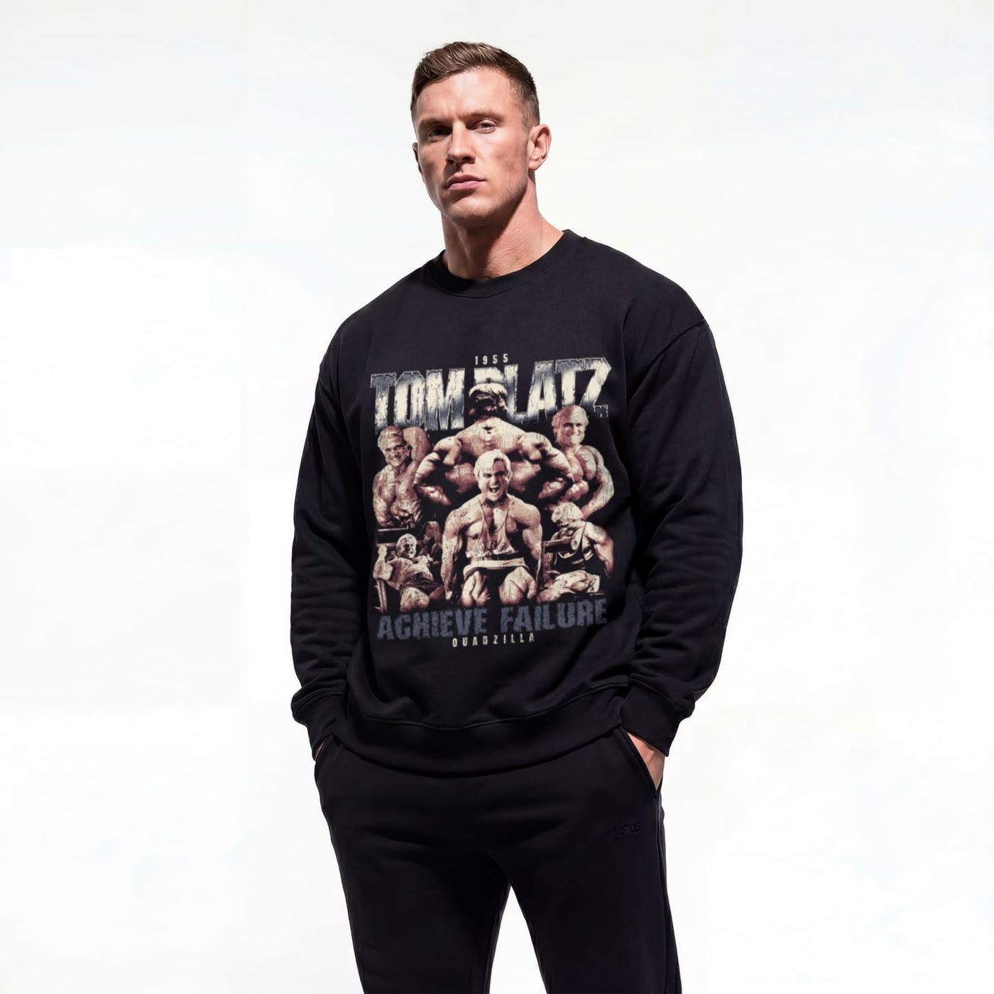 Model wearing Tom Platz Achieve Failure bodybuilding pump cover crewneck showing front graphic print