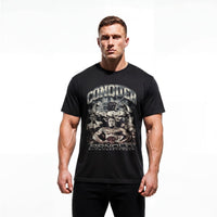 Model wearing Most Natty Conquer bodybuilding t-shirt showing relaxed classic fit