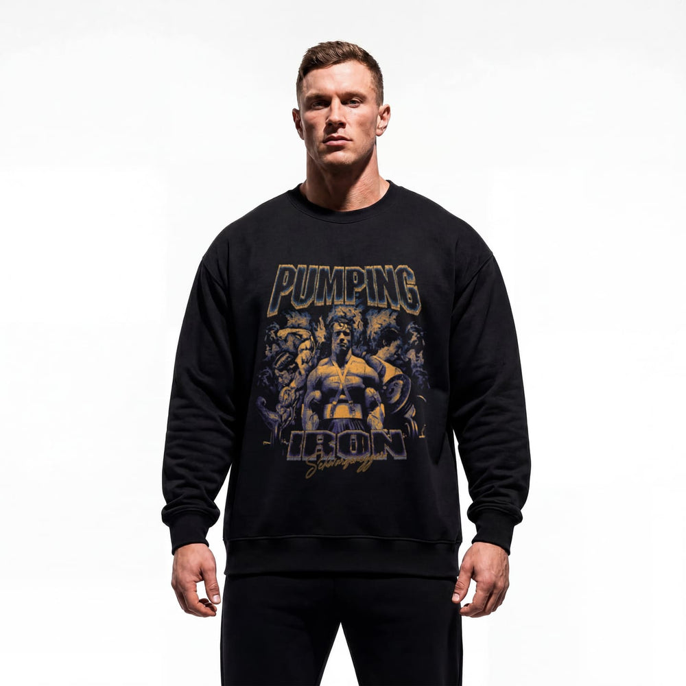 Model wearing Arnold Schwarzenegger Pumping Iron bodybuilding pump cover crewneck showing relaxed fit