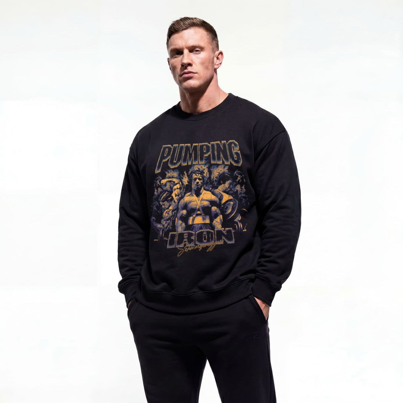 Model wearing Arnold Schwarzenegger Pumping Iron bodybuilding pump cover crewneck showing front graphic print