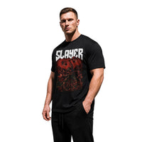 Model wearing Most Natty Slayer bodybuilding t-shirt showing front graphic print