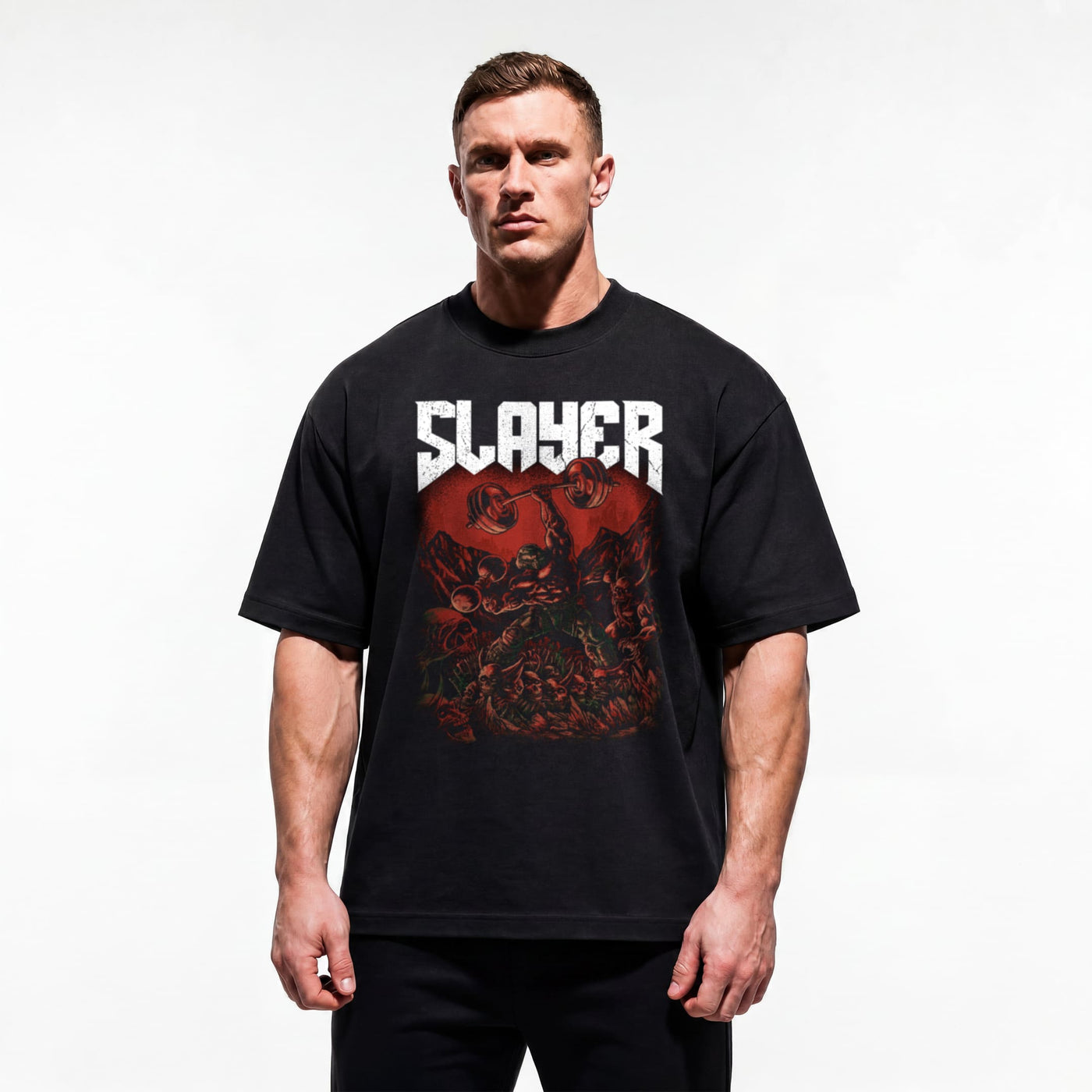Model wearing Most Natty Slayer bodybuilding oversized t-shirt showing relaxed drop-shoulder fit