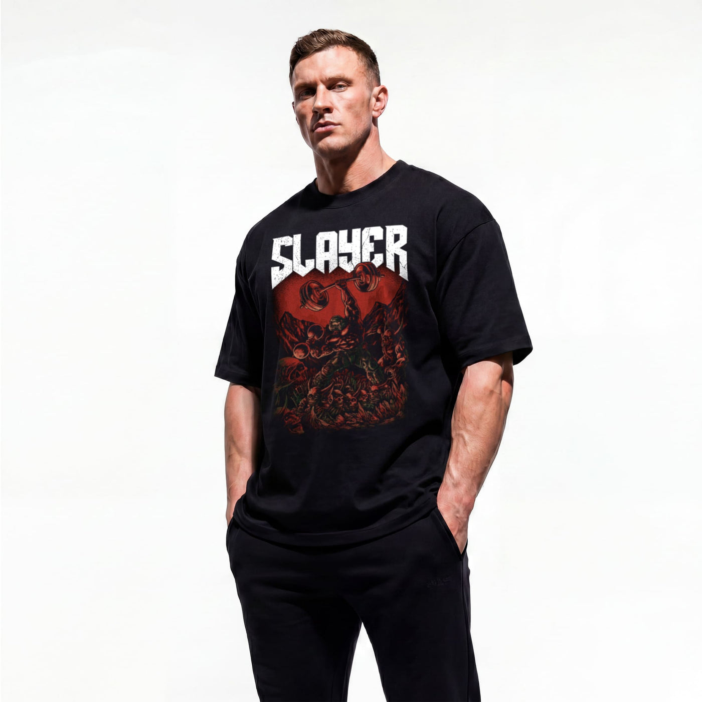 Model wearing Most Natty Slayer bodybuilding oversized t-shirt showing front graphic print