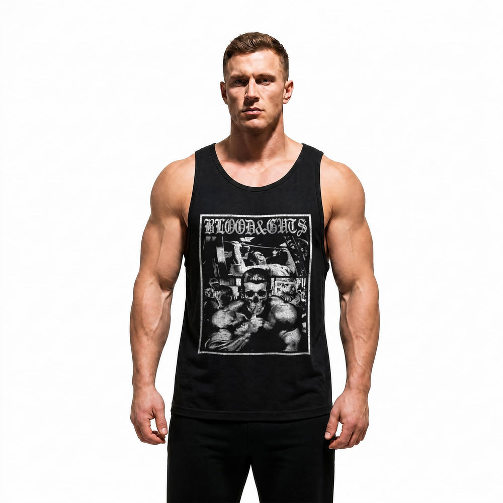 Model wearing Most Natty Blood and Guts bodybuilding tank top showing relaxed standard fit