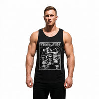 Model wearing Most Natty Blood and Guts bodybuilding tank top showing relaxed standard fit