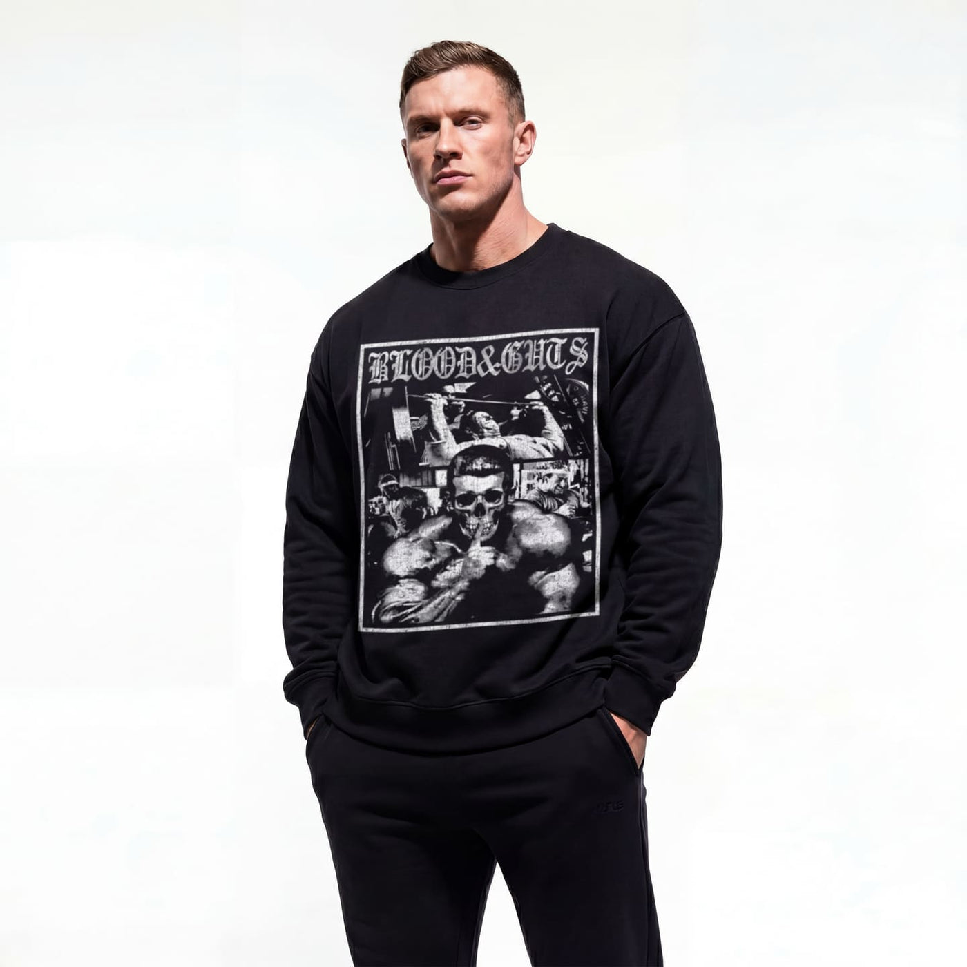 Model wearing Dorian Yates Blood and Guts bodybuilding pump cover crewneck showing front graphic print