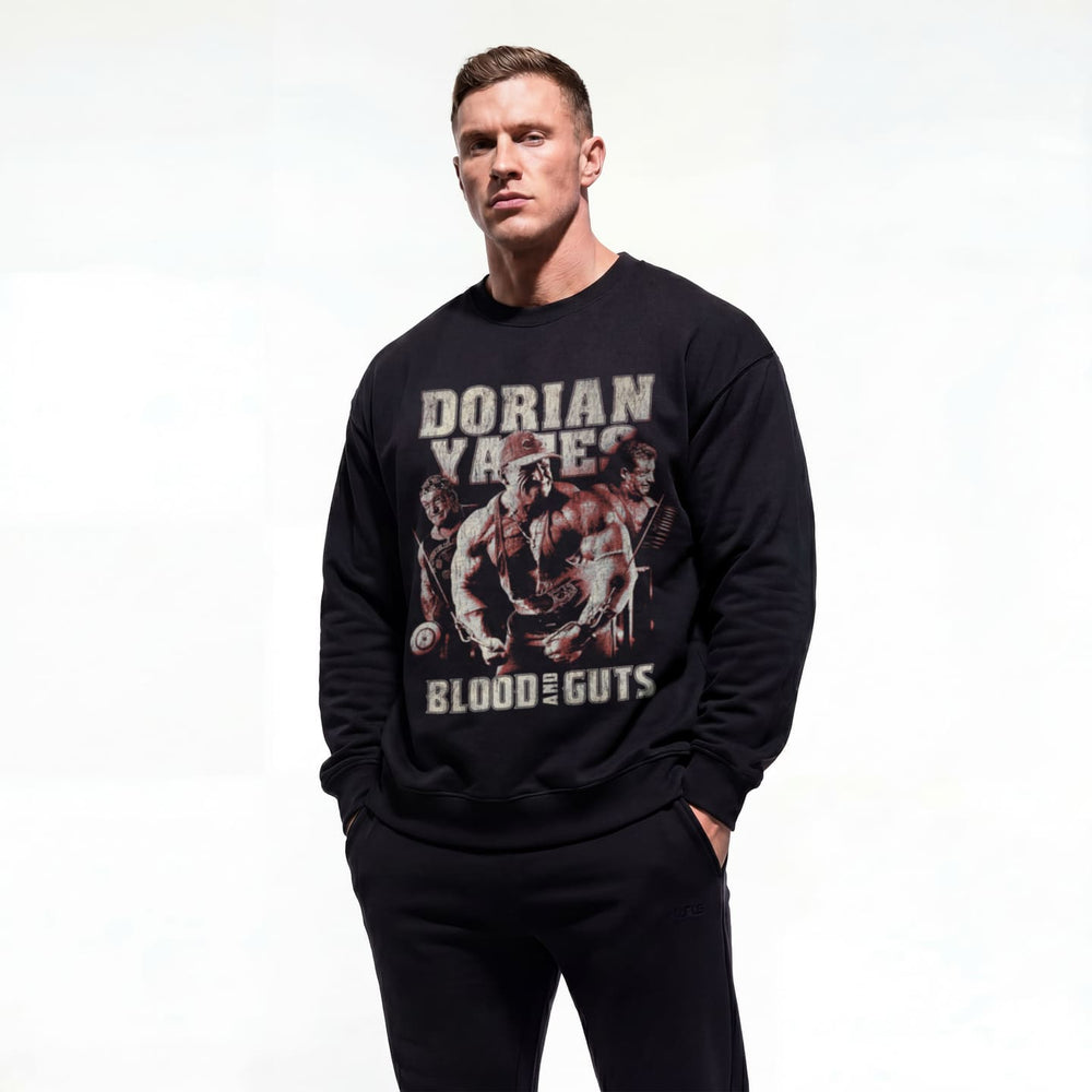 Model wearing Dorian Yates Blood and Guts bodybuilding pump cover crewneck showing front graphic print
