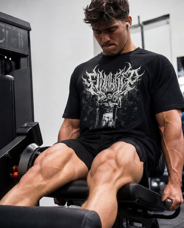 Man working out in gym wearing Final Rep T-shirt