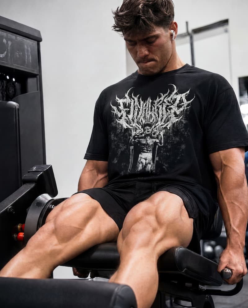 Man working out in gym wearing Final Rep T-shirt