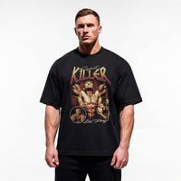 Model wearing Most Natty Giant Killer bodybuilding oversized t-shirt showing relaxed drop-shoulder fit
