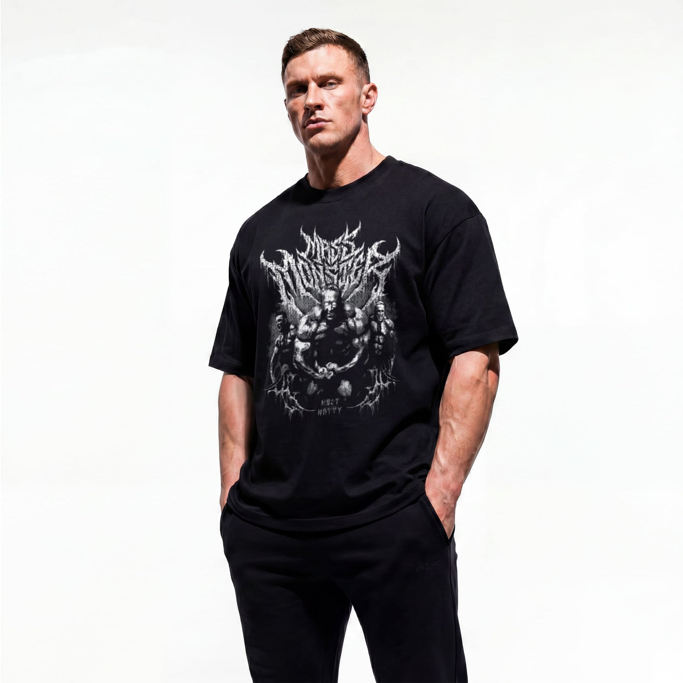 Model wearing Most Natty Mass Monster bodybuilding oversized t-shirt showing front graphic print