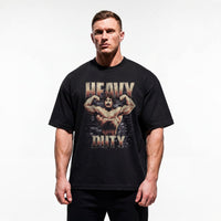 Model wearing Mike Mentzer Heavy Duty bodybuilding oversized t-shirt showing relaxed drop-shoulder fit