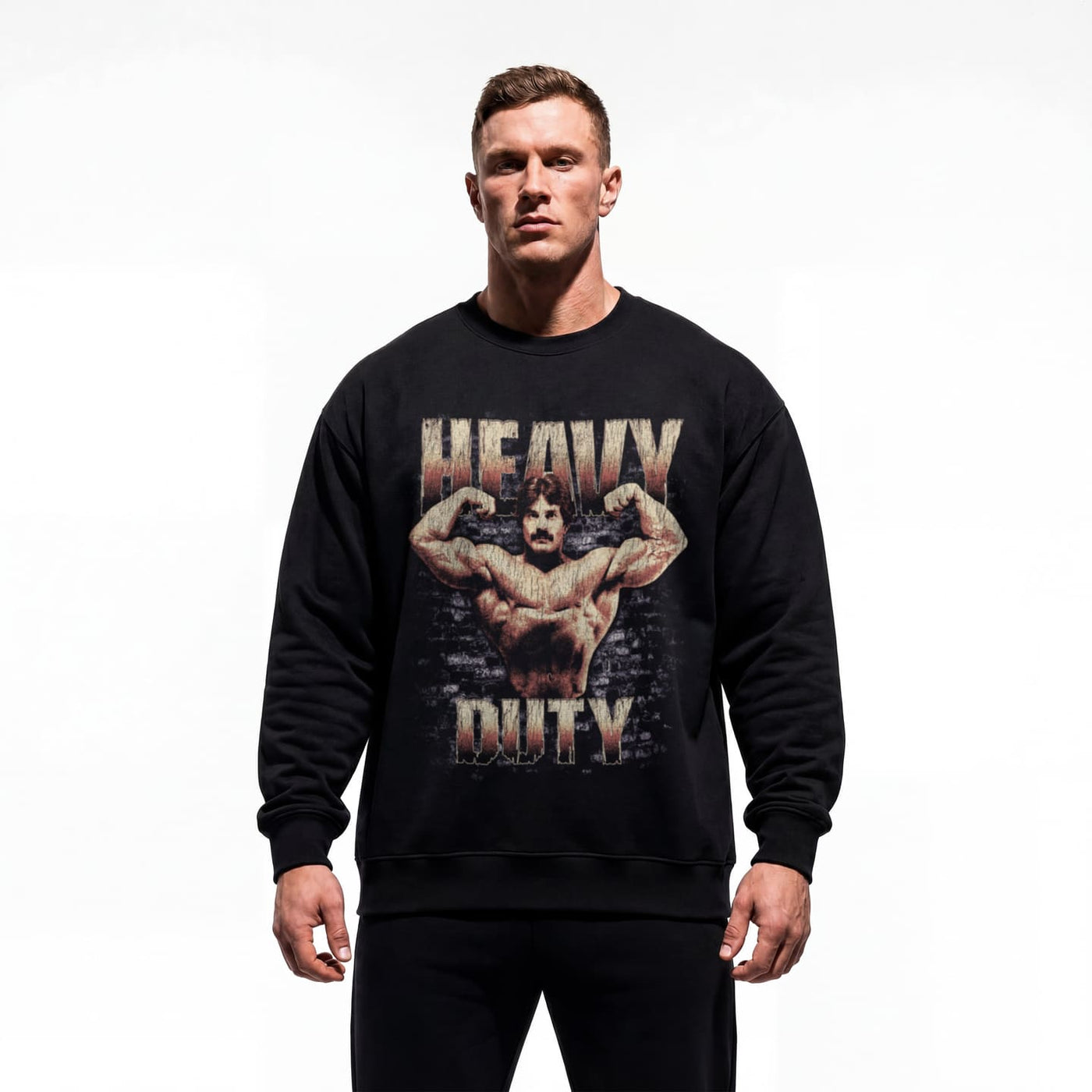 Model wearing Mike Mentzer Heavy Duty bodybuilding pump cover crewneck showing relaxed fit
