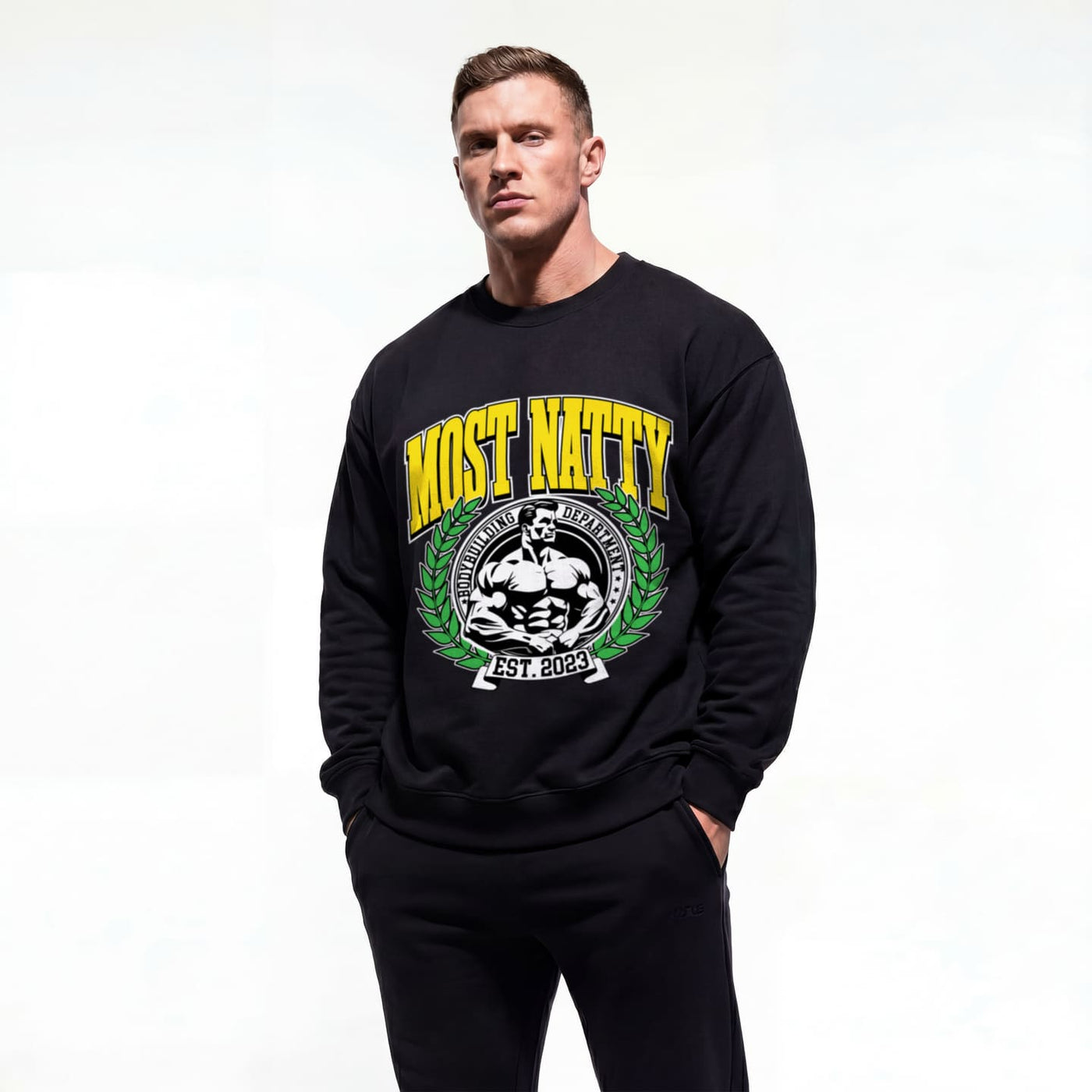 Model wearing Most Natty College bodybuilding pump cover crewneck showing front graphic print
