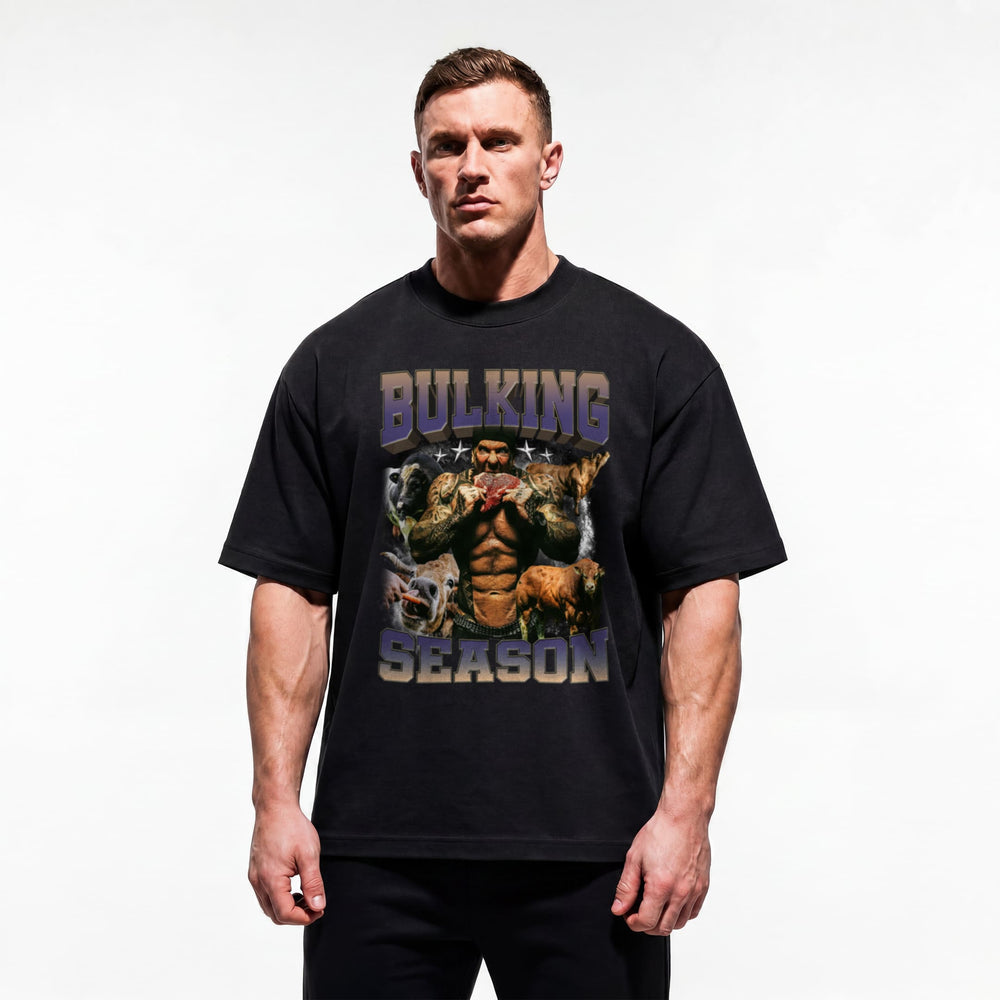 Model wearing Rich Piana Bulking Season bodybuilding oversized t-shirt showing relaxed drop-shoulder fit