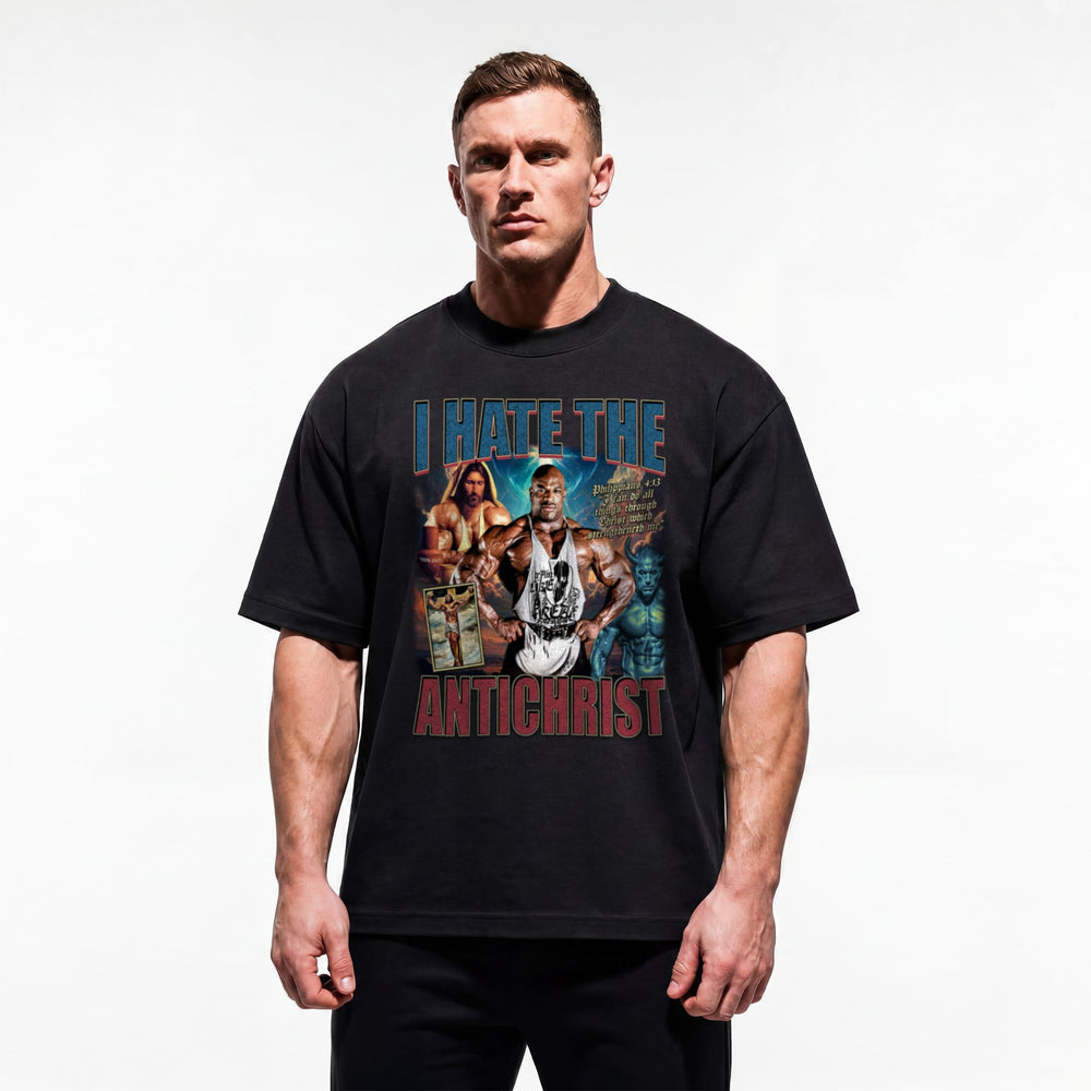 Model wearing Most Natty I Hate the Antichrist Ronnie Coleman bodybuilding oversized t-shirt showing relaxed drop-shoulder fit