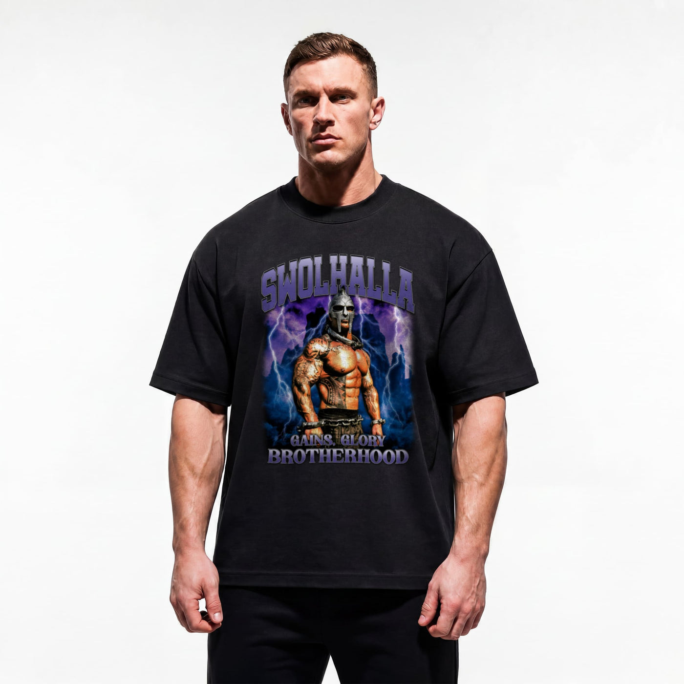 Model wearing Most Natty Swolhalla bodybuilding oversized t-shirt featuring Rich Piana, showing relaxed drop-shoulder fit
