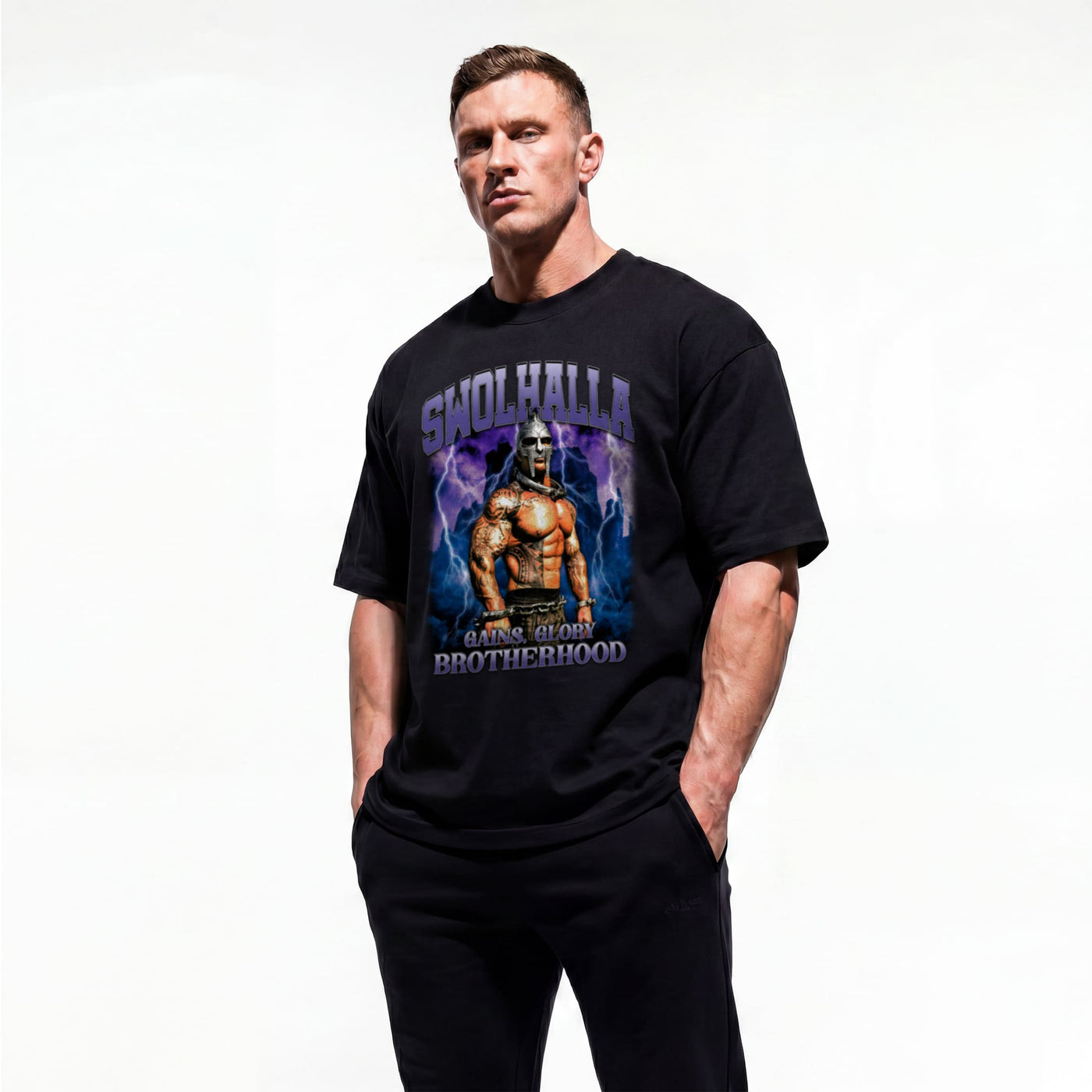 Model wearing Most Natty Swolhalla bodybuilding oversized t-shirt showing front graphic print