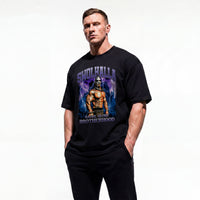 Model wearing Most Natty Swolhalla bodybuilding oversized t-shirt showing front graphic print