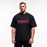 Model wearing TAKE TREN 24 bodybuilding oversized t-shirt showing relaxed drop-shoulder fit
