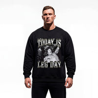 Model wearing Mike Mentzer Today Is Leg Day bodybuilding pump cover crewneck showing relaxed fit