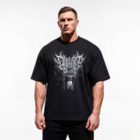 Model wearing Most Natty Final Rep bodybuilding oversized t-shirt featuring Tom Platz showing relaxed drop-shoulder fit