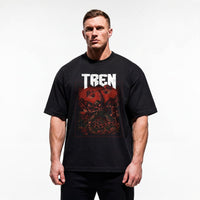Model wearing Most Natty Tren Slayer bodybuilding oversized t-shirt showing relaxed drop-shoulder fit
