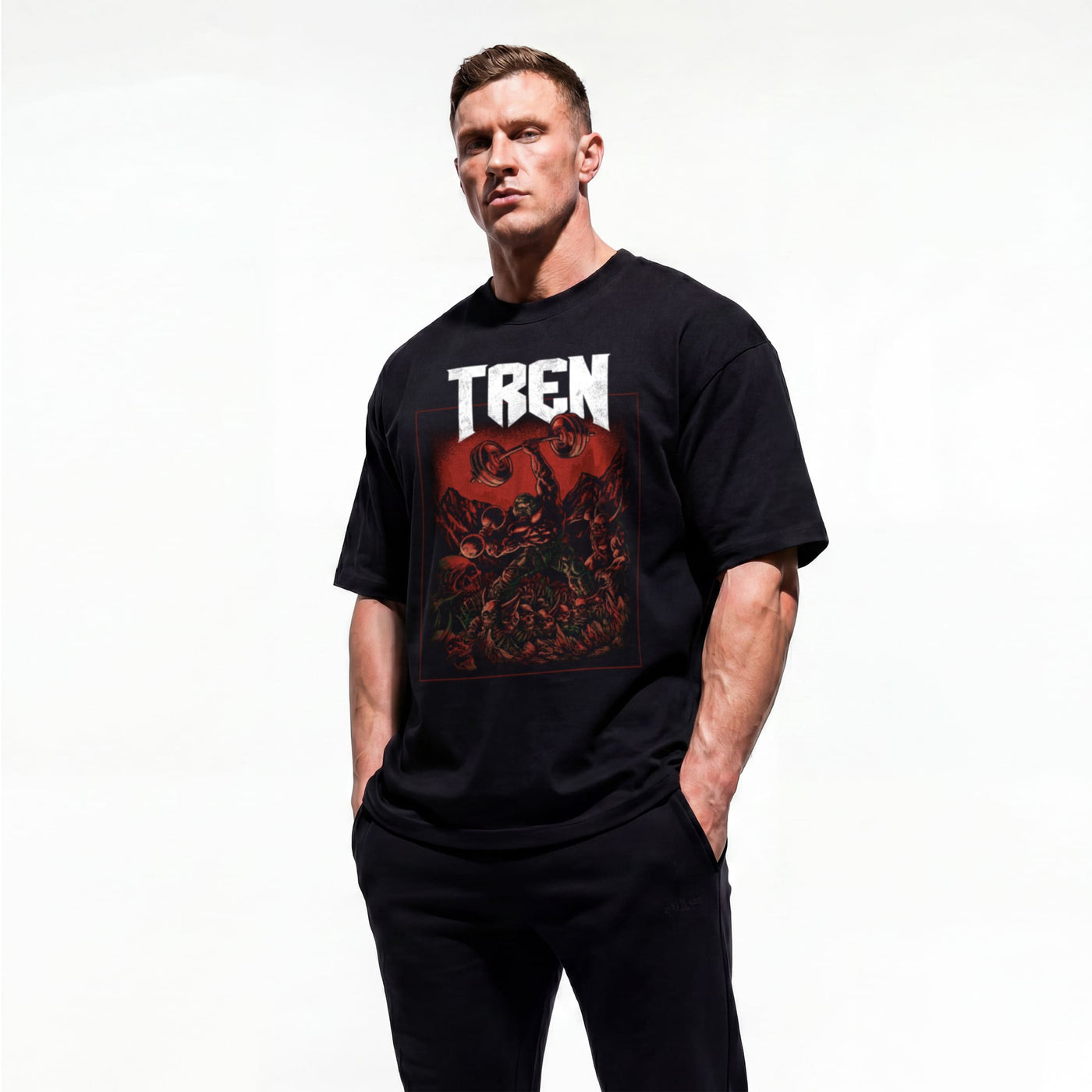 Model wearing Most Natty Tren Slayer bodybuilding oversized t-shirt showing front graphic print
