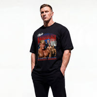 Model wearing Most Natty Make Anabolics Great Again bodybuilding oversized t-shirt showing front graphic print