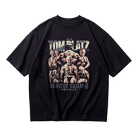 Most Natty Achieve Failure Tom Platz oversized gym t-shirt front flat lay on white background