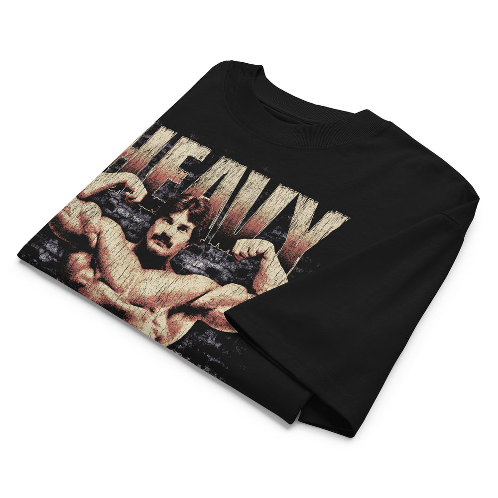 Mike Mentzer Heavy Duty oversized gym t-shirt folded showing black garment fabric and drop-shoulder cut