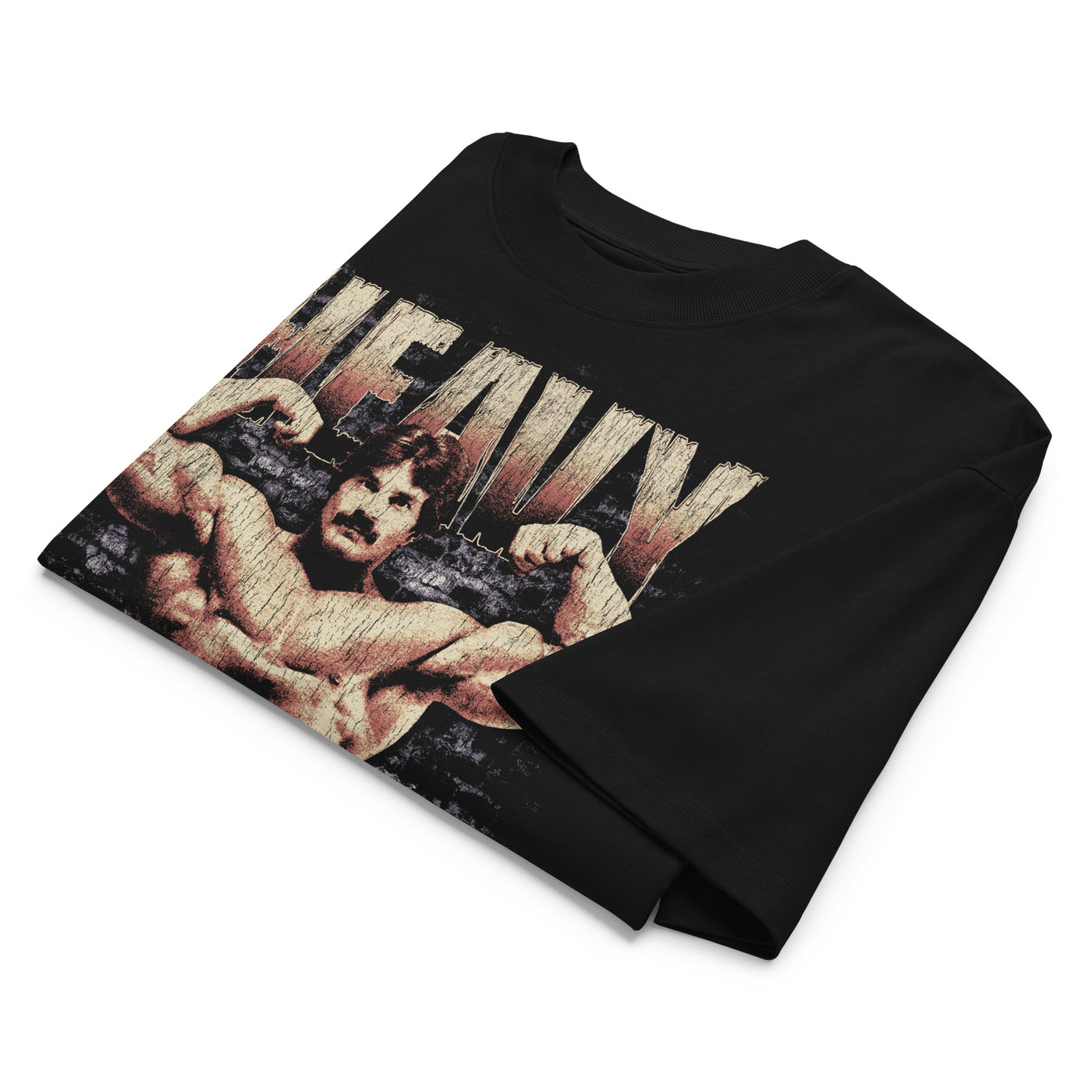 Mike Mentzer Heavy Duty oversized gym t-shirt folded showing black garment fabric and drop-shoulder cut